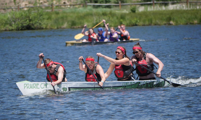 Students rowing their canoe during the 2019 competition