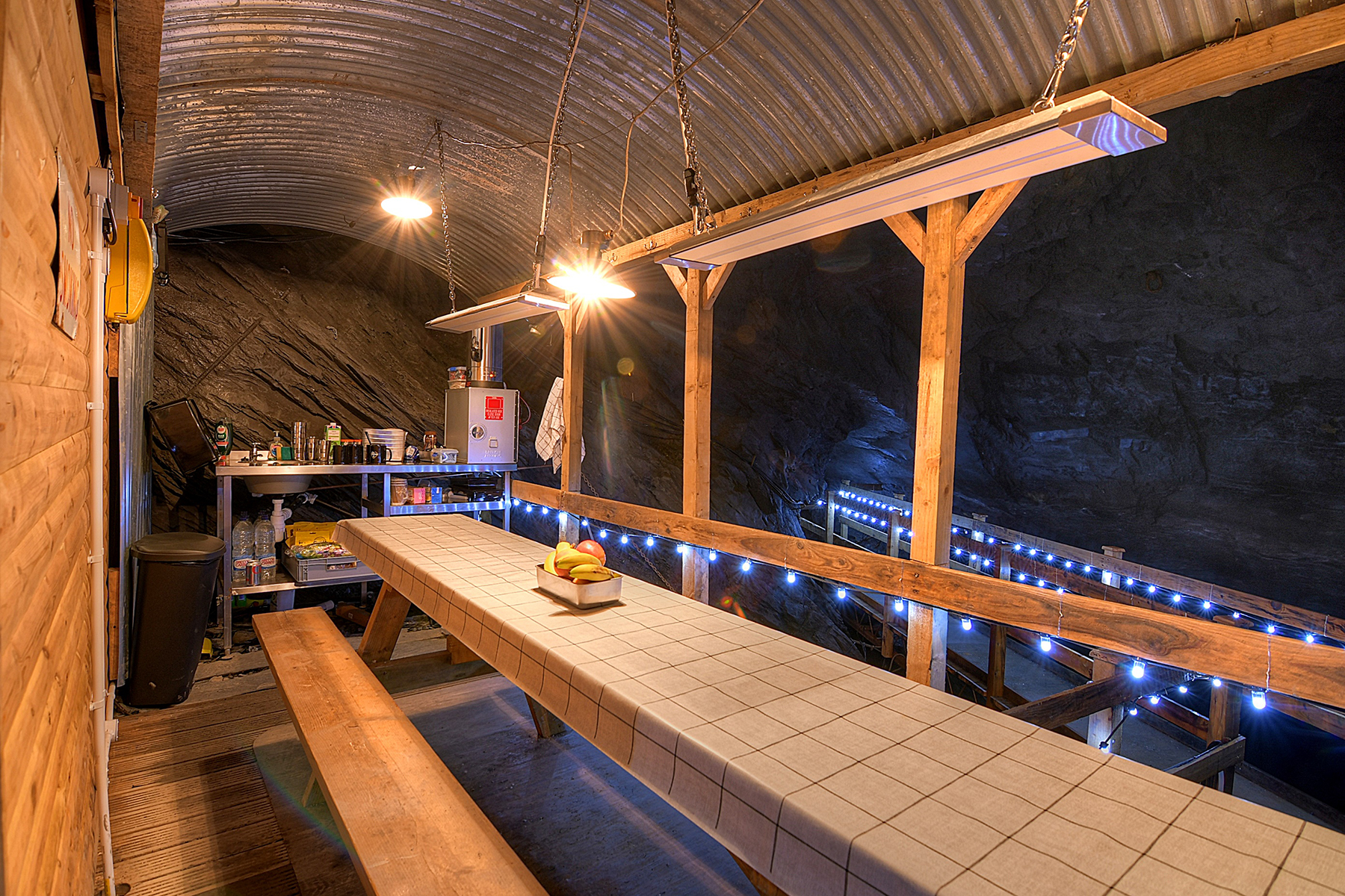 EATING AREA WITH PICNIC TABLE IN UNDERGROUND CAVERN