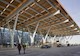 The signature design motif of the 1.1 million sq ft new terminal project is a roof that cantilevers 35 ft out from the arrivals hall. (Image courtesy of Lucas Blair Simpson/© SOM) 