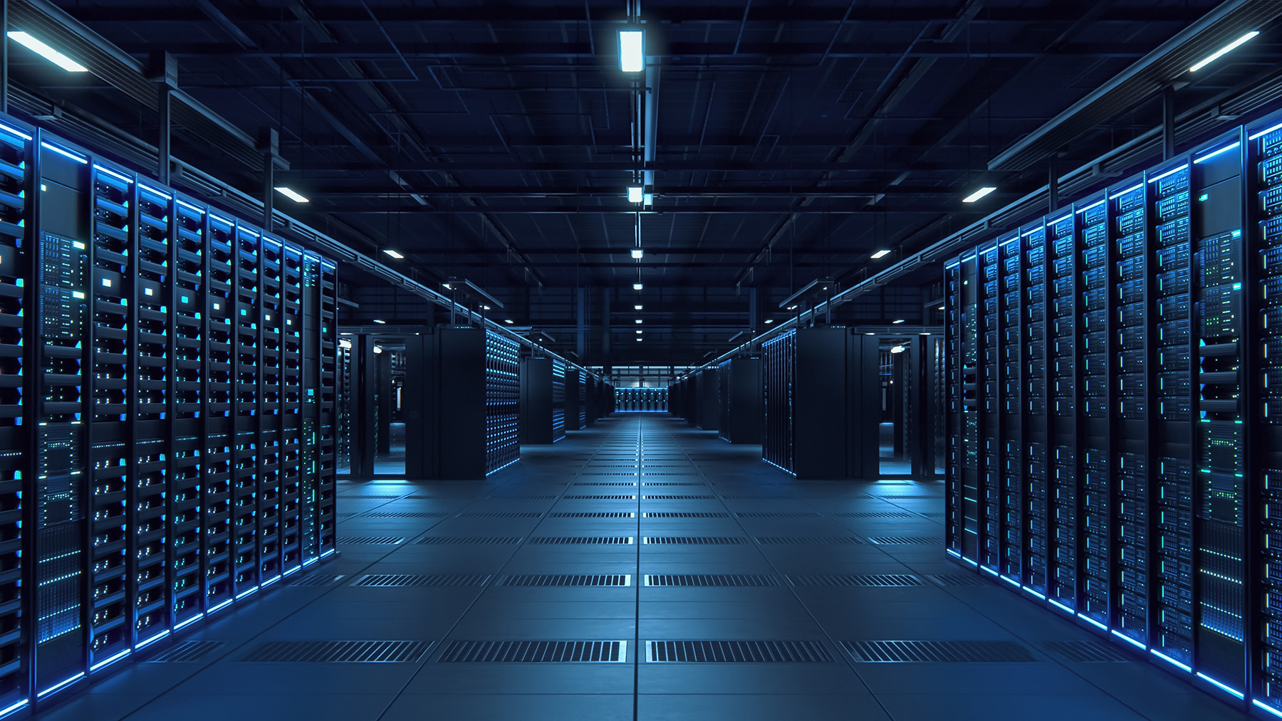 Rows of servers, bathed in blue light, stand ready to support the digital world. 