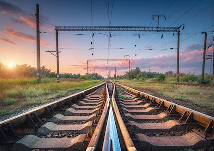Railway tracks and beautiful sky at sunset