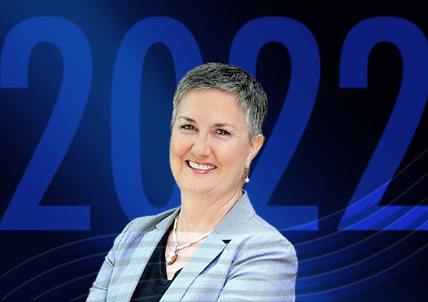 Portrait of Marsia Geldert-Murphey with blue 2022 background