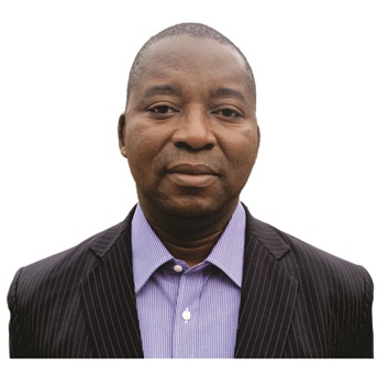 Portrait of Emmanuel A. Adeyemo, Ph.D., P.E., F.ASCE - a man with dark brown hair wearing a blue shirt and black striped suit jacket smiles at the camera