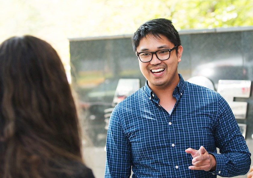 People standing in front of ASCE HQ