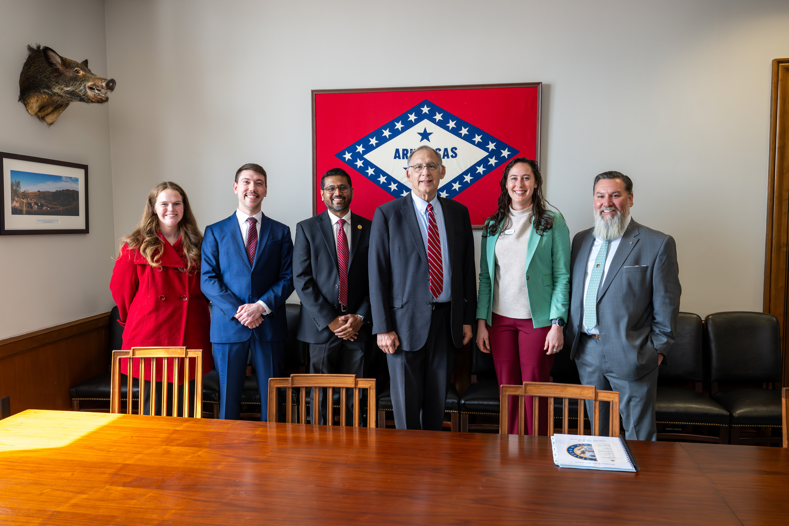 U.S. Senator John Boozman stands with five members of the ASCE Arkansas team in his Capitol Hill office.