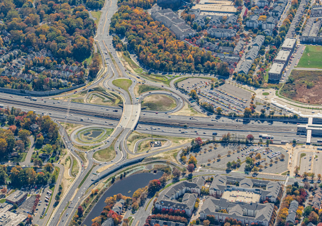 Aerial view of the Nutley Interchange, showing circular ramps, overpasses, and surrounding road networks.