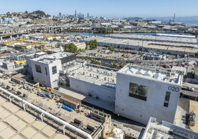 Aerial view of the Southeast Treatment Plant, with industrial facilities, adjacent waterways, and surrounding urban infrastructure.