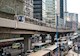 Rail and public transportation outside an apartment building at Kwun Tong, Hong Kong