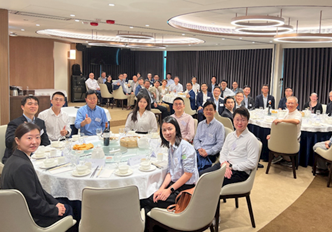 Greater China Section Luncheon. Pictured are 42 people sitting at tables in a banquet hall. 