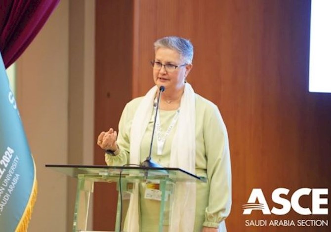 One person standing at a podium giving a speech. 