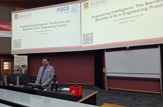 Parsa Yazdi, President of ASCE New Zealand Section, delivering a keynote speech and welcoming attendees at the Engineering Intelligence Colloquium.