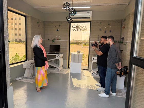 President Marsha inside the 3D constructed building   