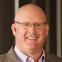 Portrait of Chris Kelly