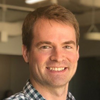 Man in checked shirt.