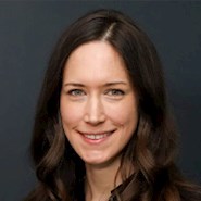 Woman in dark blouse