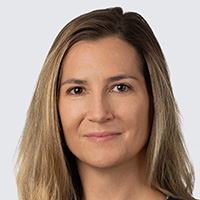 The photo shows a young woman with long, light-colored hair.