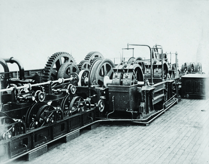 black and white photo of a cable-laying machine