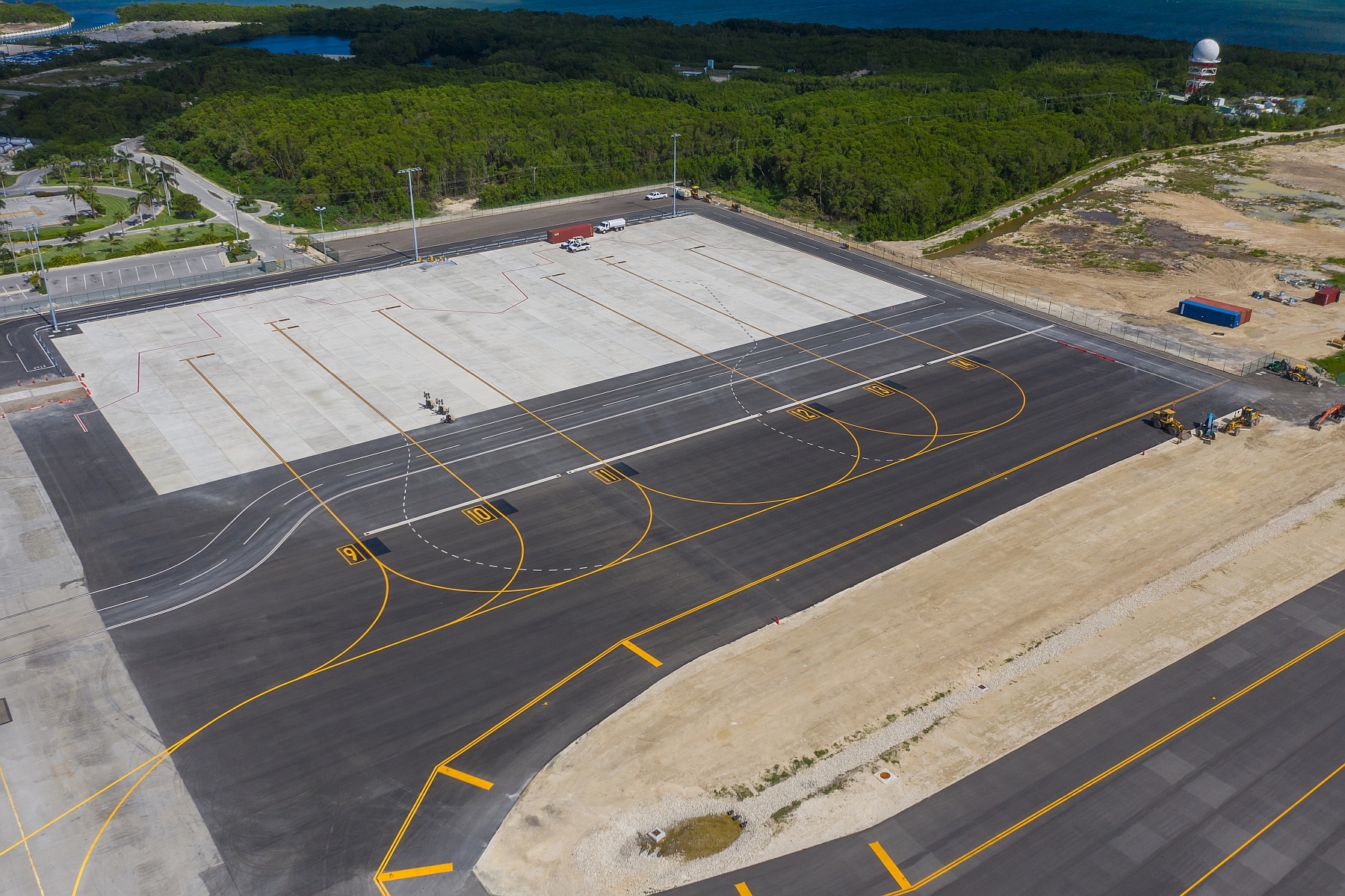 airline parking apron at Owen Roberts International Airport on Grand Cayman, the Cayman Islands