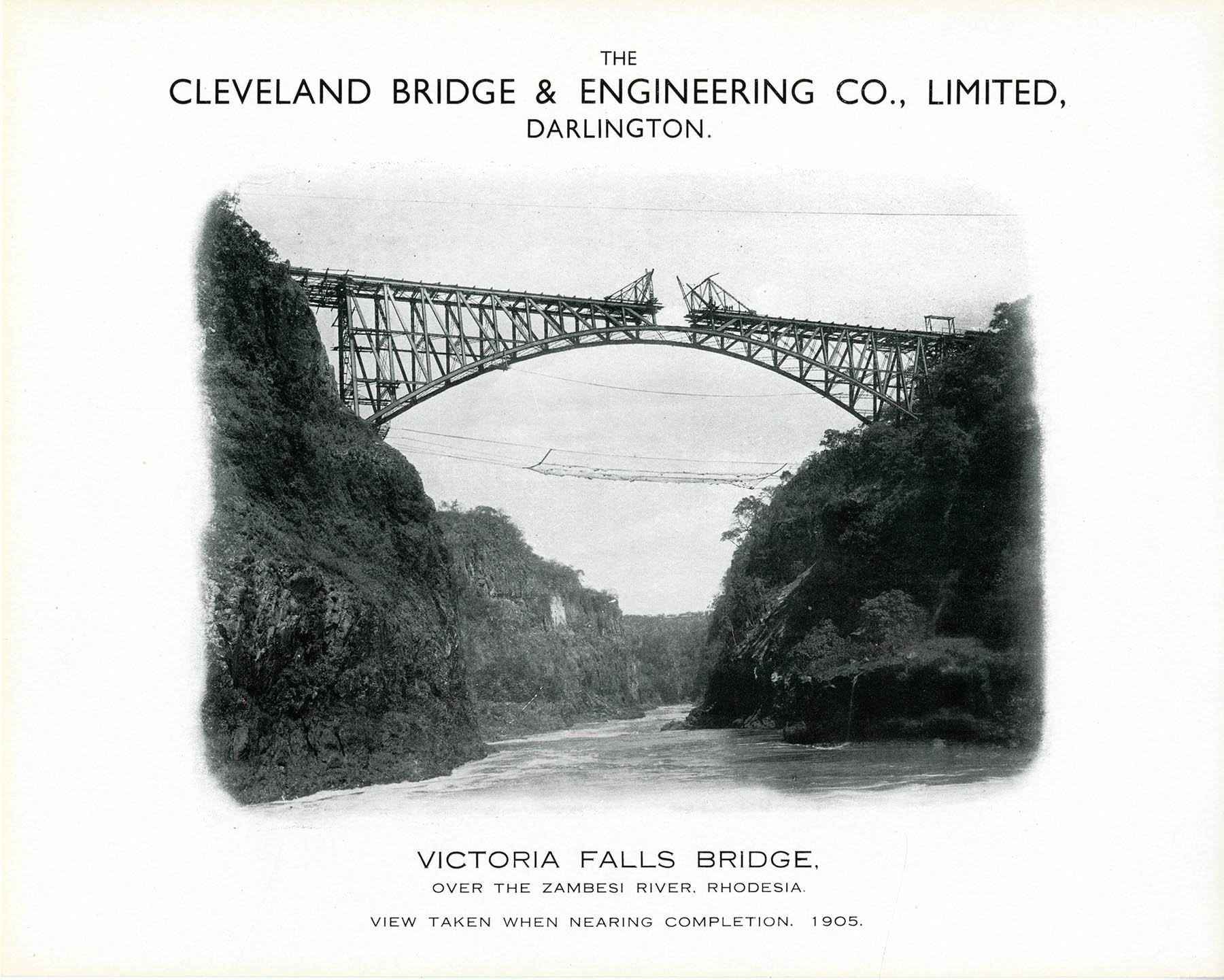 cantilevered construction image of two sides of Victoria Falls bridge almost connected