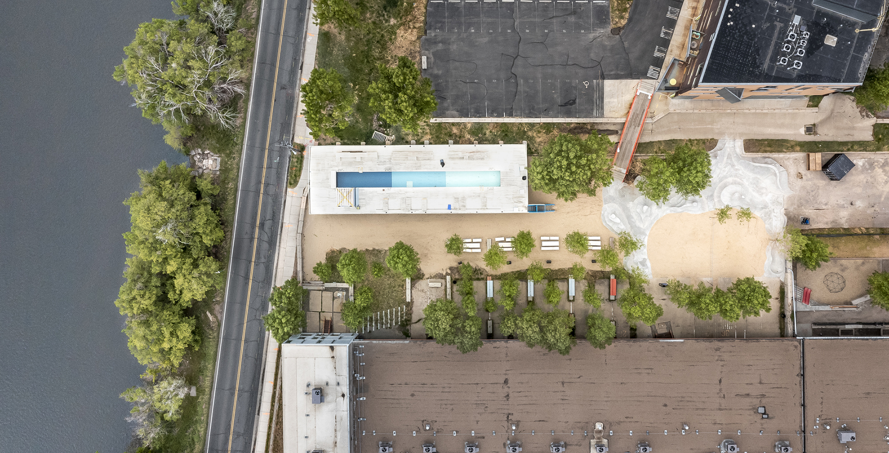 aerial of artwork installation and river