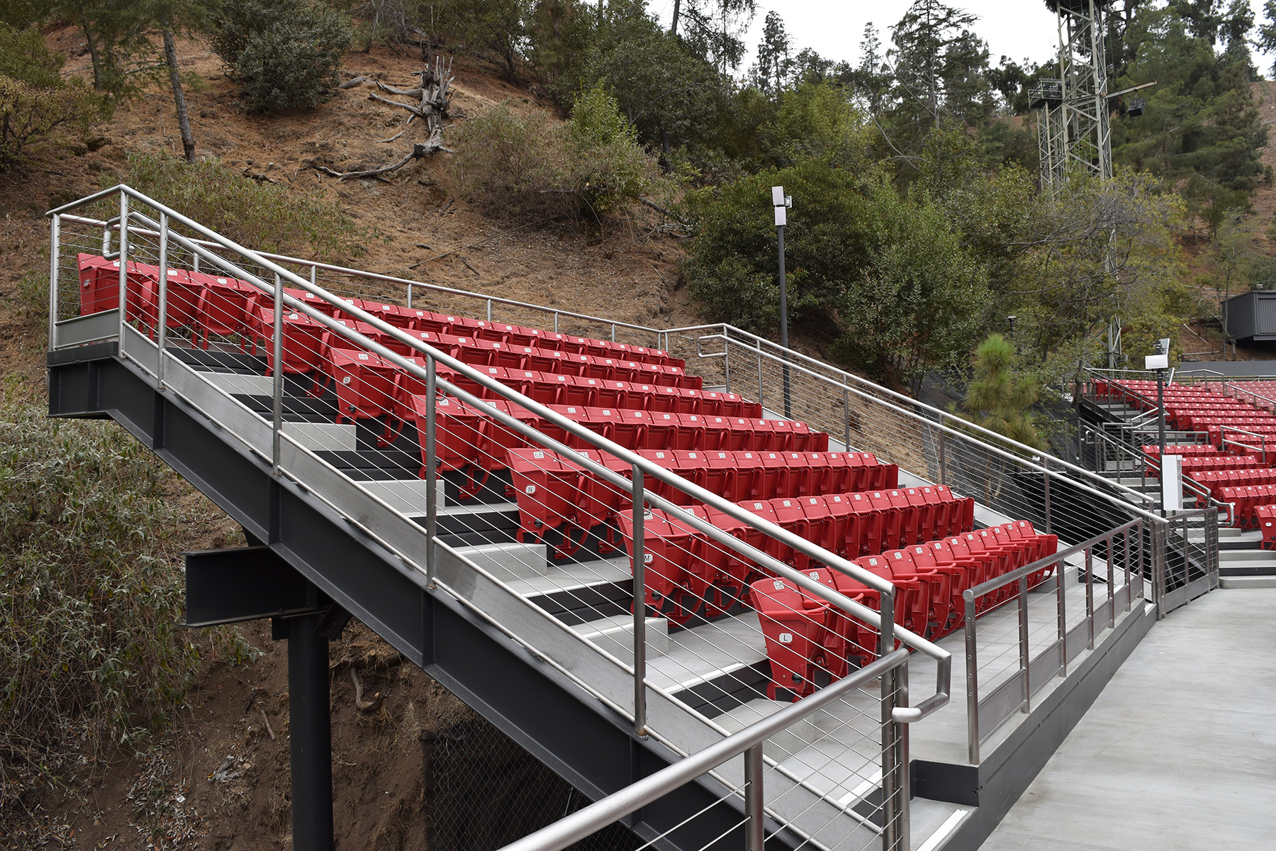 outdoor tiered seating backed by a hill