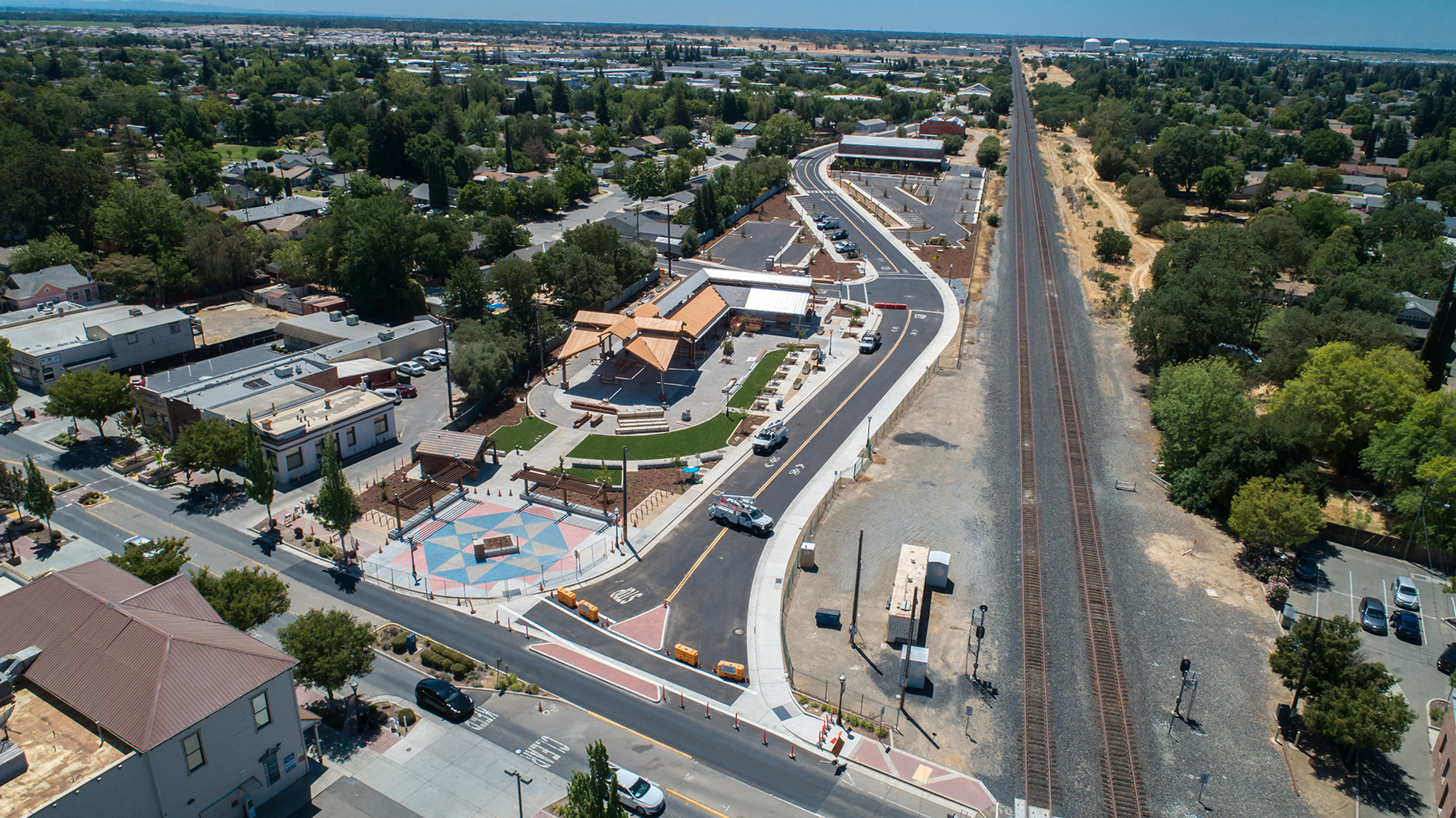 aerial of rail, road, and pavilion