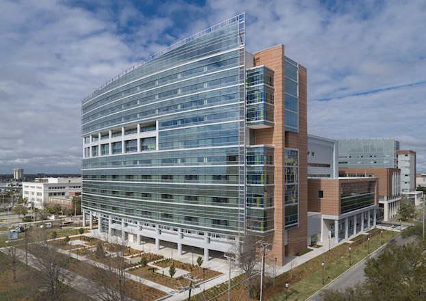 multi story glass, concrete, and bring structure