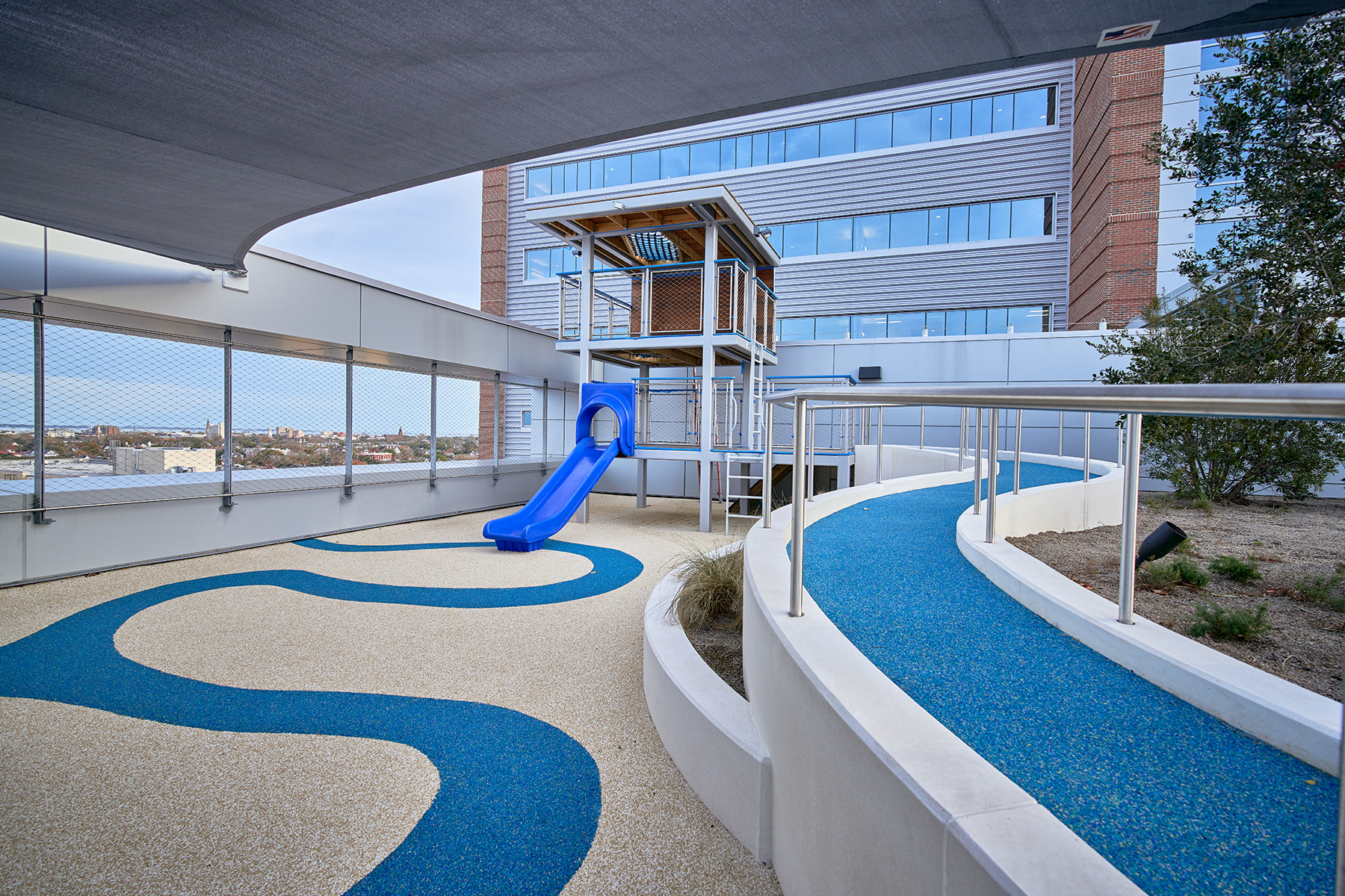 children’s play area showing a slide and a maze