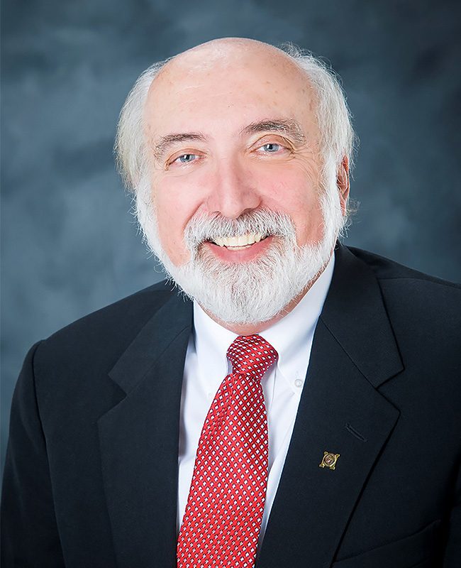 man in suit smiling