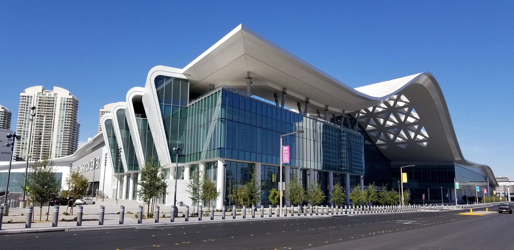 Exterior photograph of a building with an undulating roof