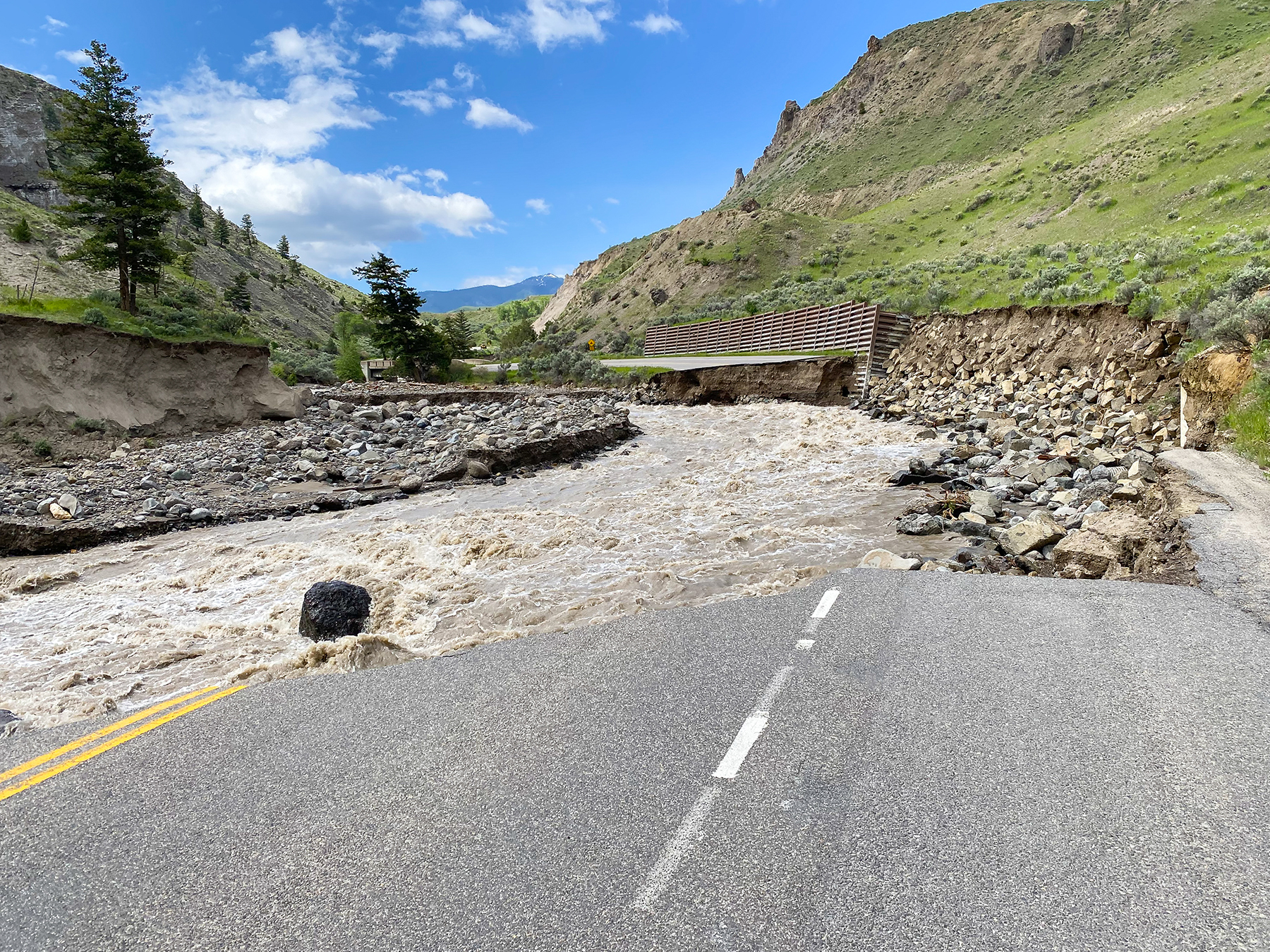 Extensive flood damage from the Gardner River rendered Yellowstone’s North Entrance Road impassable, raising the prospect that the critical roadway may need to be relocated away from the environmentally sensitive Gardner Canyon. (Photograph courtesy of NPS / Jacob W. Frank)