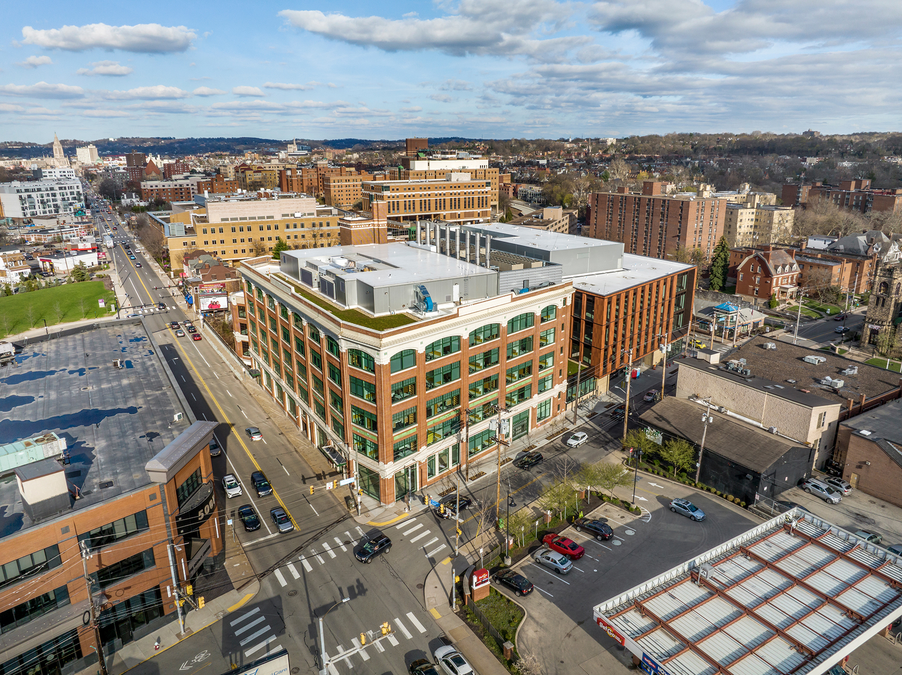 Exterior of the front of the renovated building and the new building (Courtesy Triggs Photography)