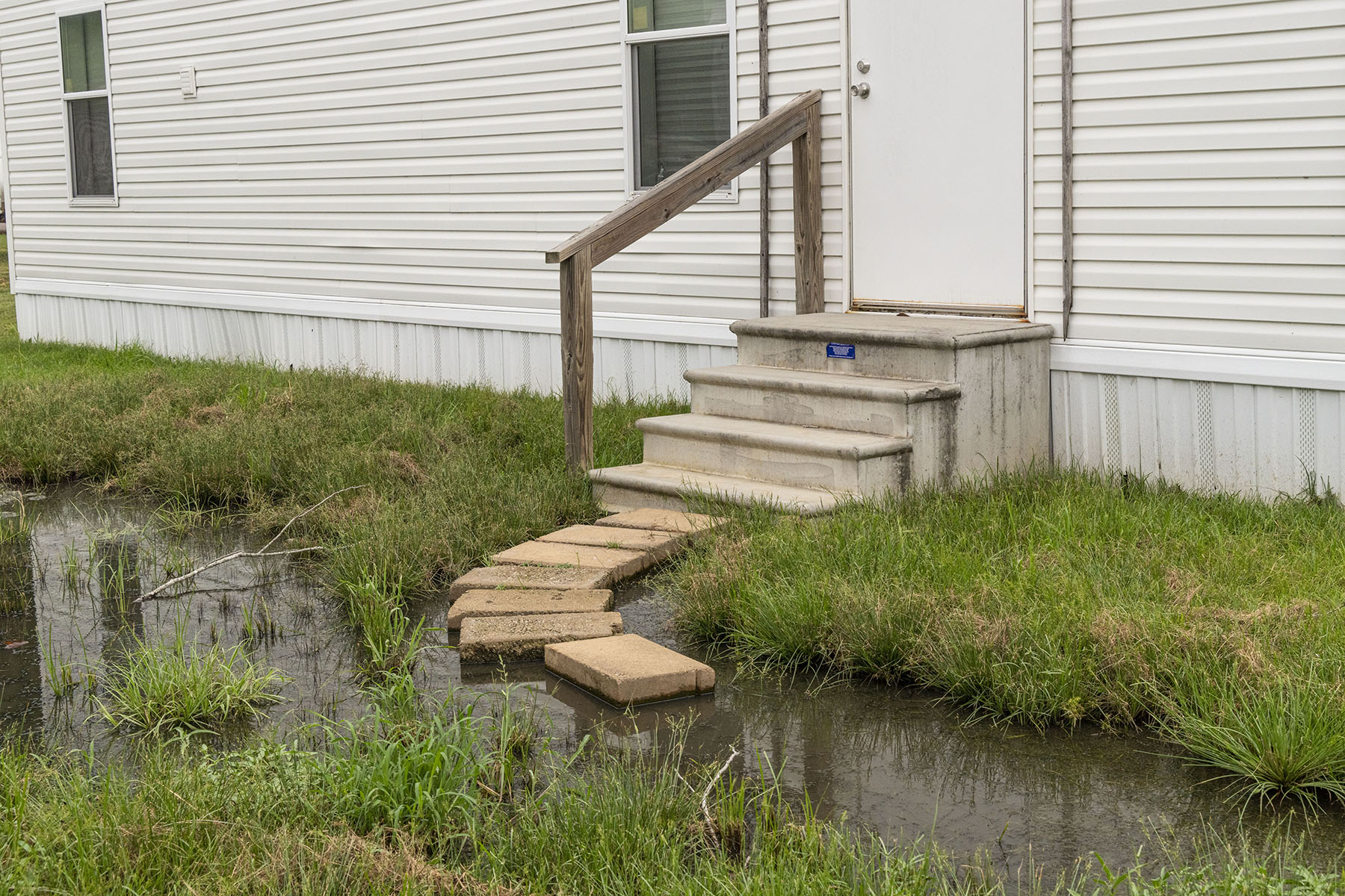 standing raw sewage outside a home's door