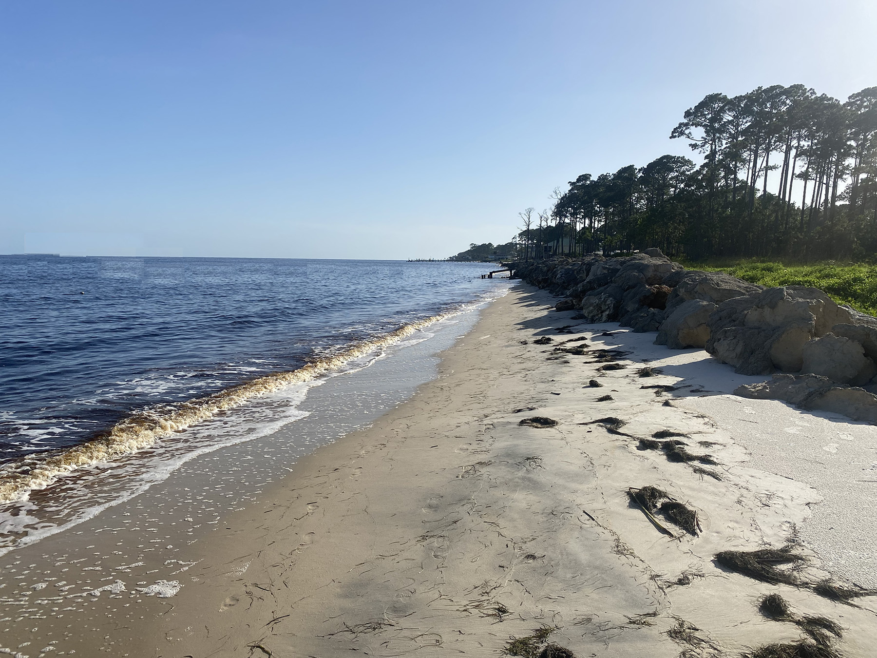 Rendering of a coastline damaged by erosion. 