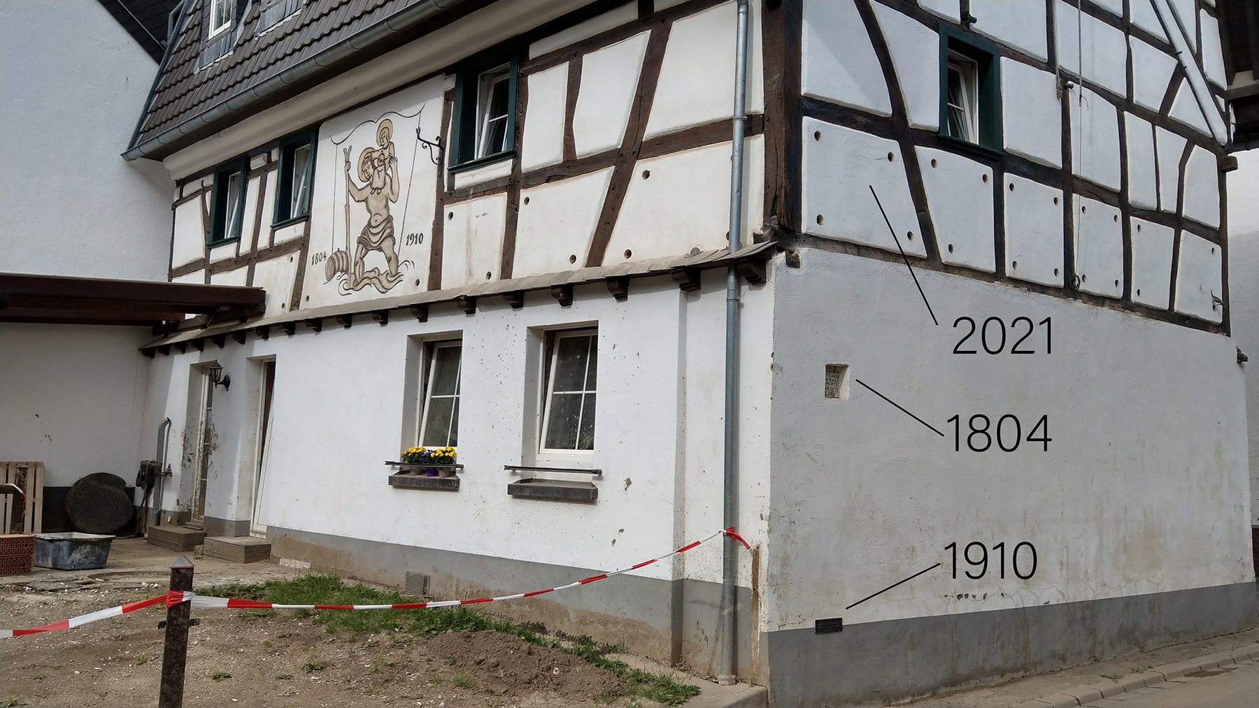 The Ahr Valley is no stranger to flooding events. This house in Walporzheim, Germany, shows the high-water levels of past floods.  (Photograph courtesy of University of Göttingen/Michael Dietze)