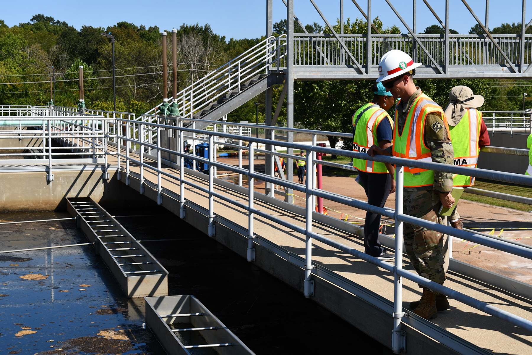 Capt. Hayden Schappell, a hydraulic engineer in the U.S. Army Corps of Engineers’ Vicksburg District, observes the O.B. Curtis Water Treatment Plant’s Basin 2 during an assessment in Jackson, Mississippi, on Sept. 26. (Photo by Anna Owens, https://www.mvk.usace.army.mil/Media/Images/igphoto/2003102941/)