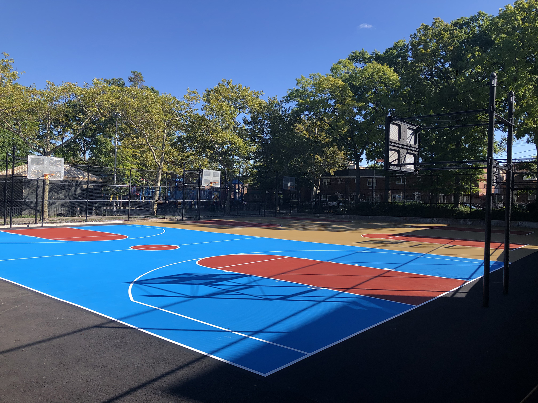 The completed basketball court that tops the new detention basin. (Photograph courtesy of Hunter Roberts Construction Group)