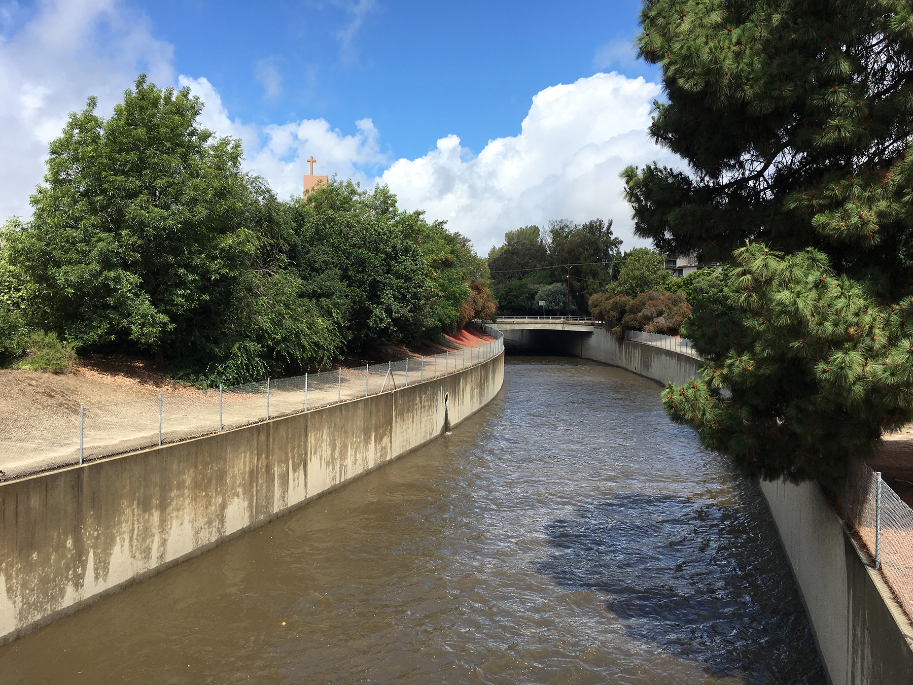 During dry weather, the heavily modified Los Angeles River, shown here below Sepulveda Dam, consists mainly of treated wastewater effluent. (Image courtesy of Jordyn Wolfand)