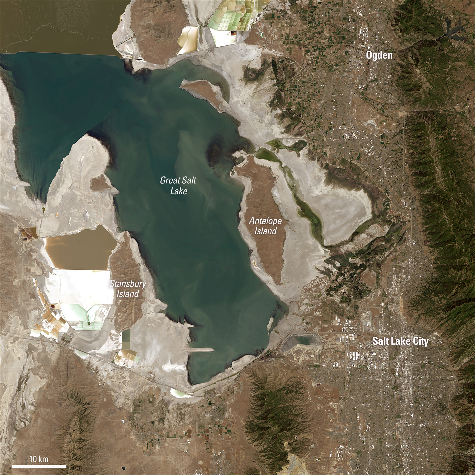 In early July 2022, the Great Salt Lake had dropped to an elevation of 4,190.1 feet, as measured by a gauge at the southern end of the lake. At the time, this elevation was the lowest since data recording began in 1847. (Image courtesy of Michelle Bouchard using Landsat data from the U.S. Geological Survey)