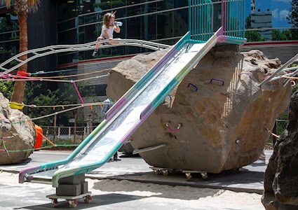 Rocks on Wheels is a new playground in Melbourne, Australia, that is most notable for its use of boulders that are situated on what appear to be regular furniture dollies. (Image courtesy of Mike Hewson)