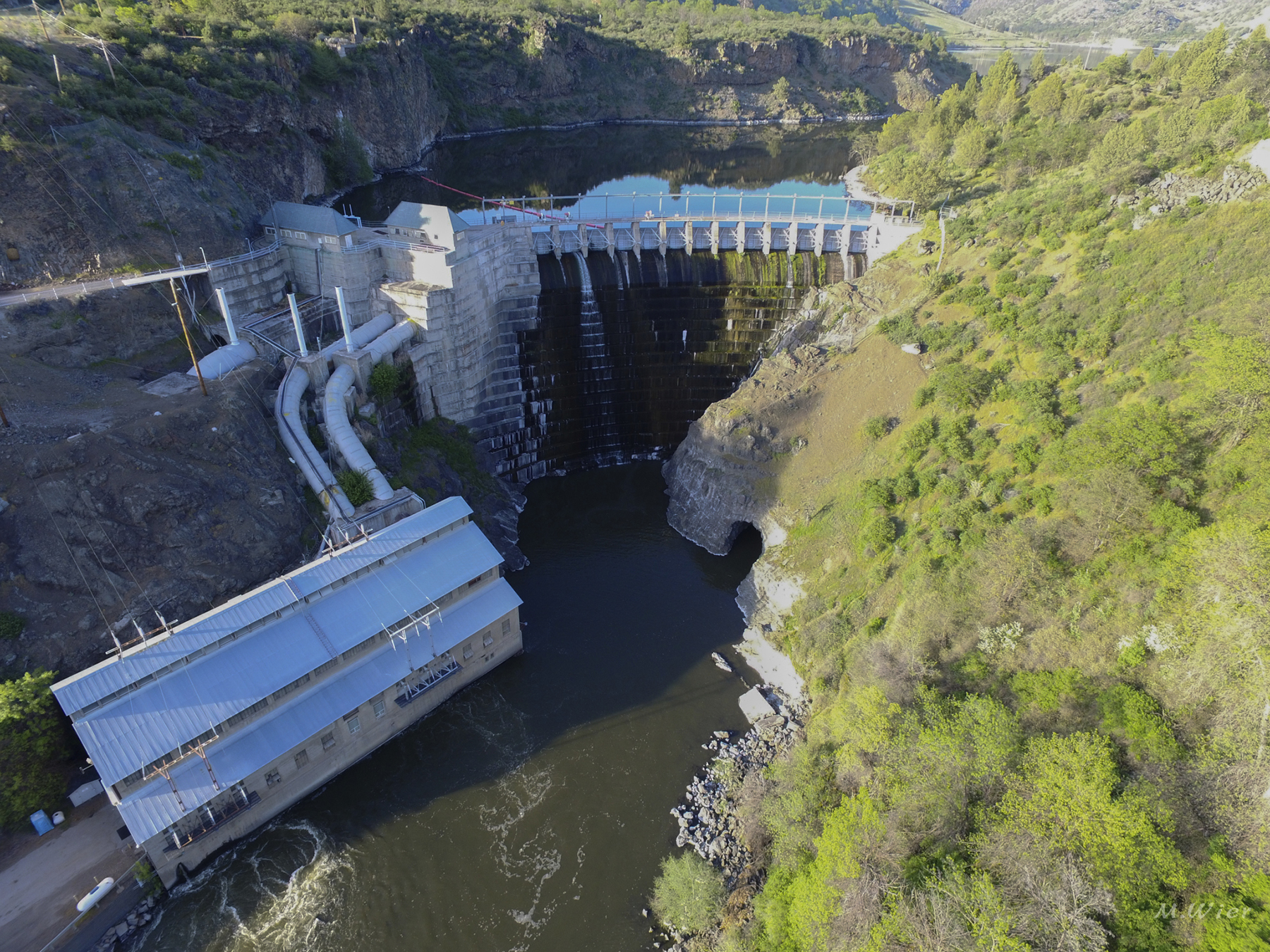 The 126 ft tall, 415 ft long Copco No. 1 Dam is a concrete gravity arch structure that was completed in California in 1918. (Image courtesy of Michael Wier/California Trout)