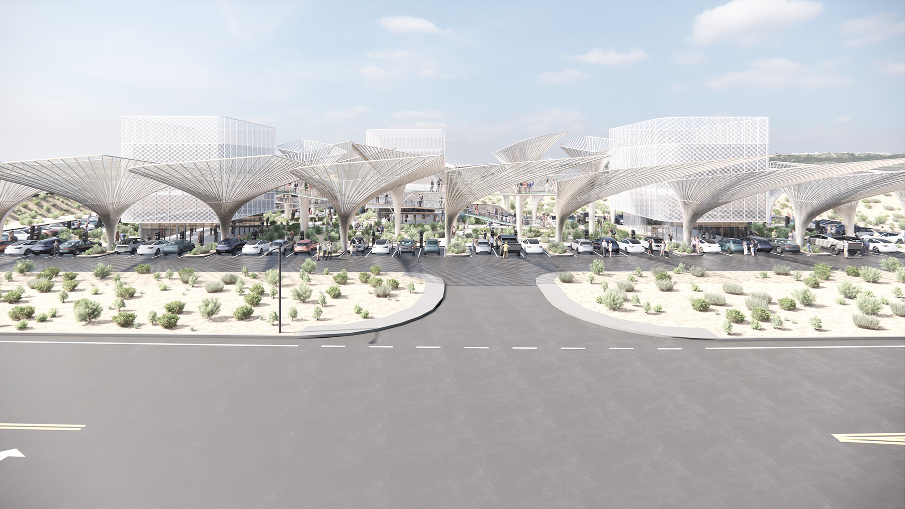 Tall, white multipronged structures stick out of the ground. There are cars parked next to the structures.
