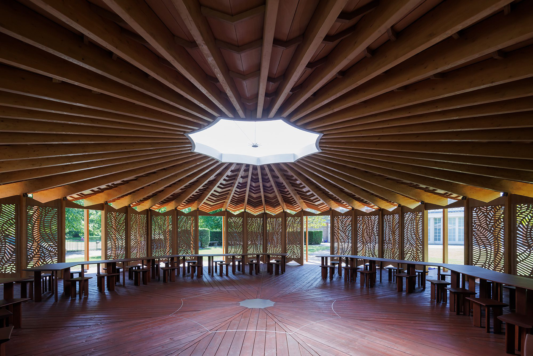 Serpentine Pavilion 2023 designed by Lina Ghotmeh. © Lina Ghotmeh — Architecture. (Image by Iwan Baan, courtesy of Serpentine)