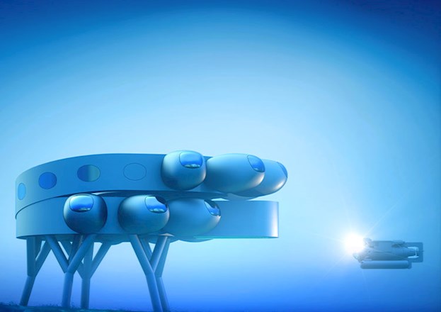 The rendering shows a modular underwater laboratory with multiple stories and large protuberances.