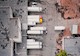 AERIAL OF PARKED TRUCKS AT WAREHOUSE