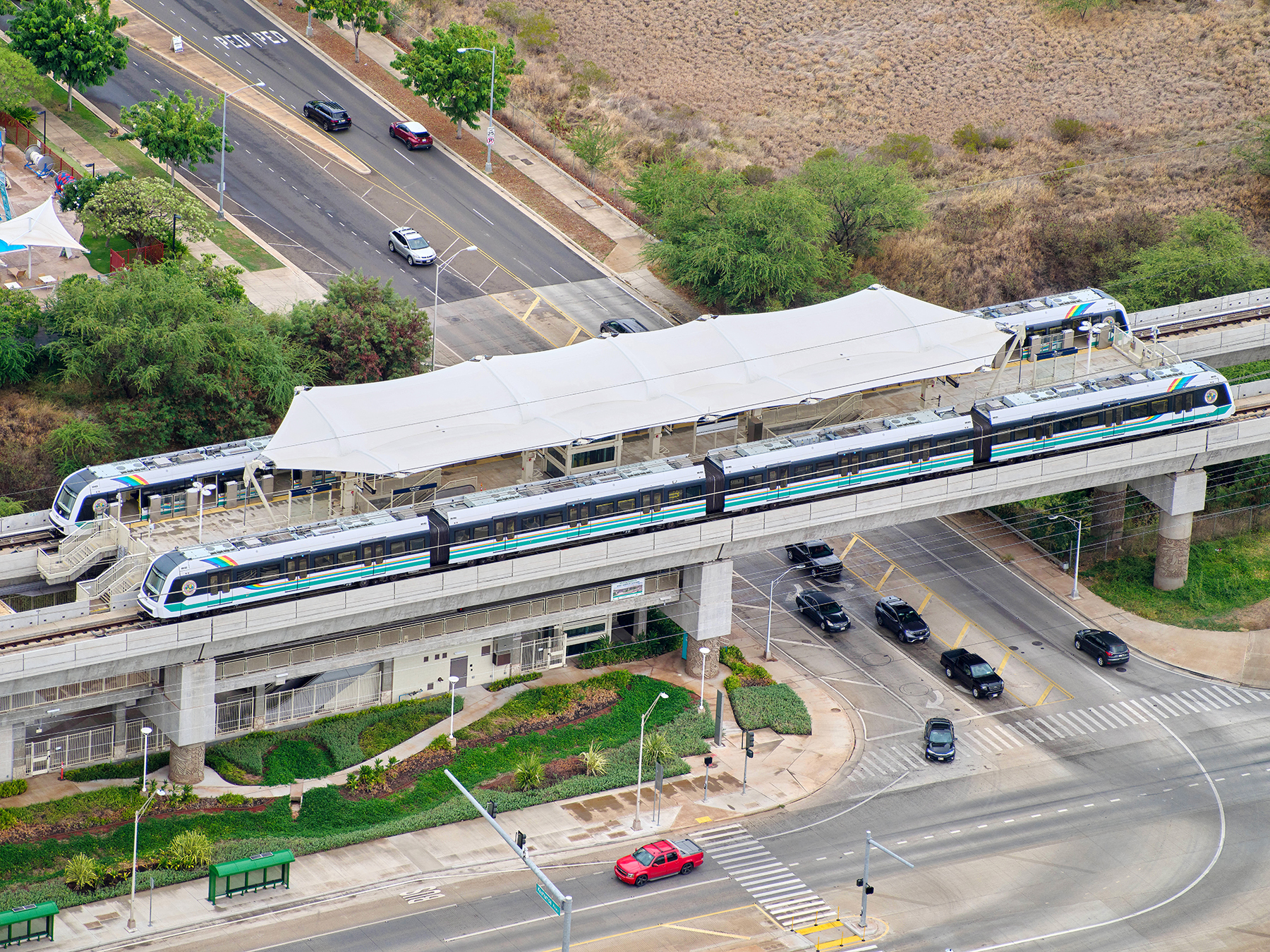 Skyline opened in June; shown here are trains at the Kualakai/East Kapolei station. (Image courtesy of HART)