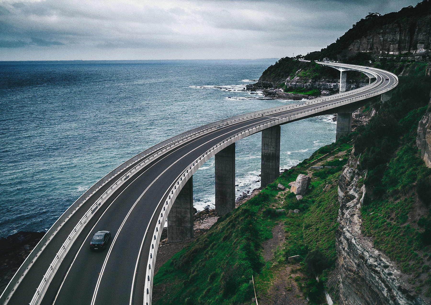 Bridge winds through the landscape.