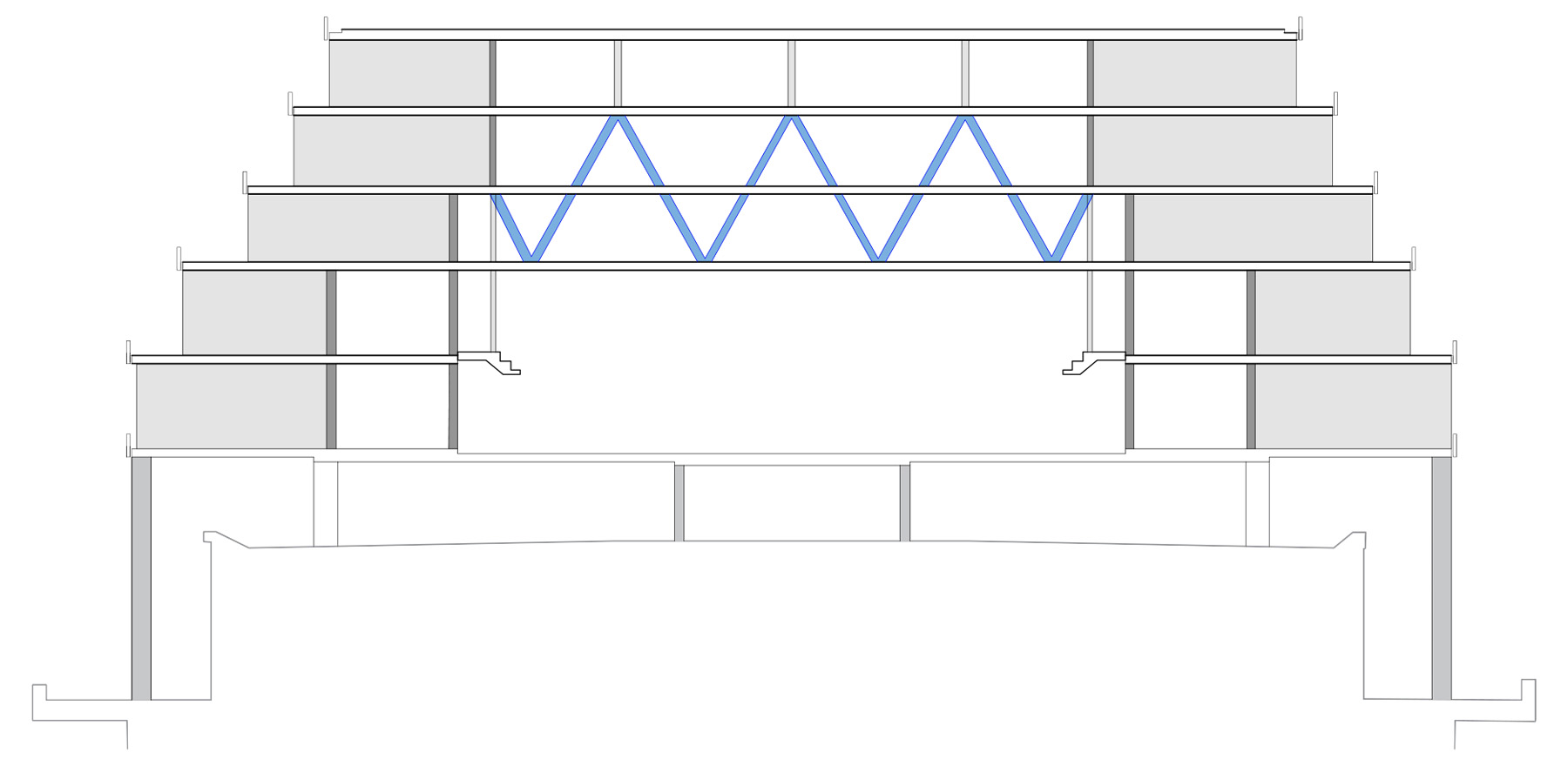 The drawing shows a close-up cutaway view of the steel truss supporting the floors above the two-story gymnasium. 
