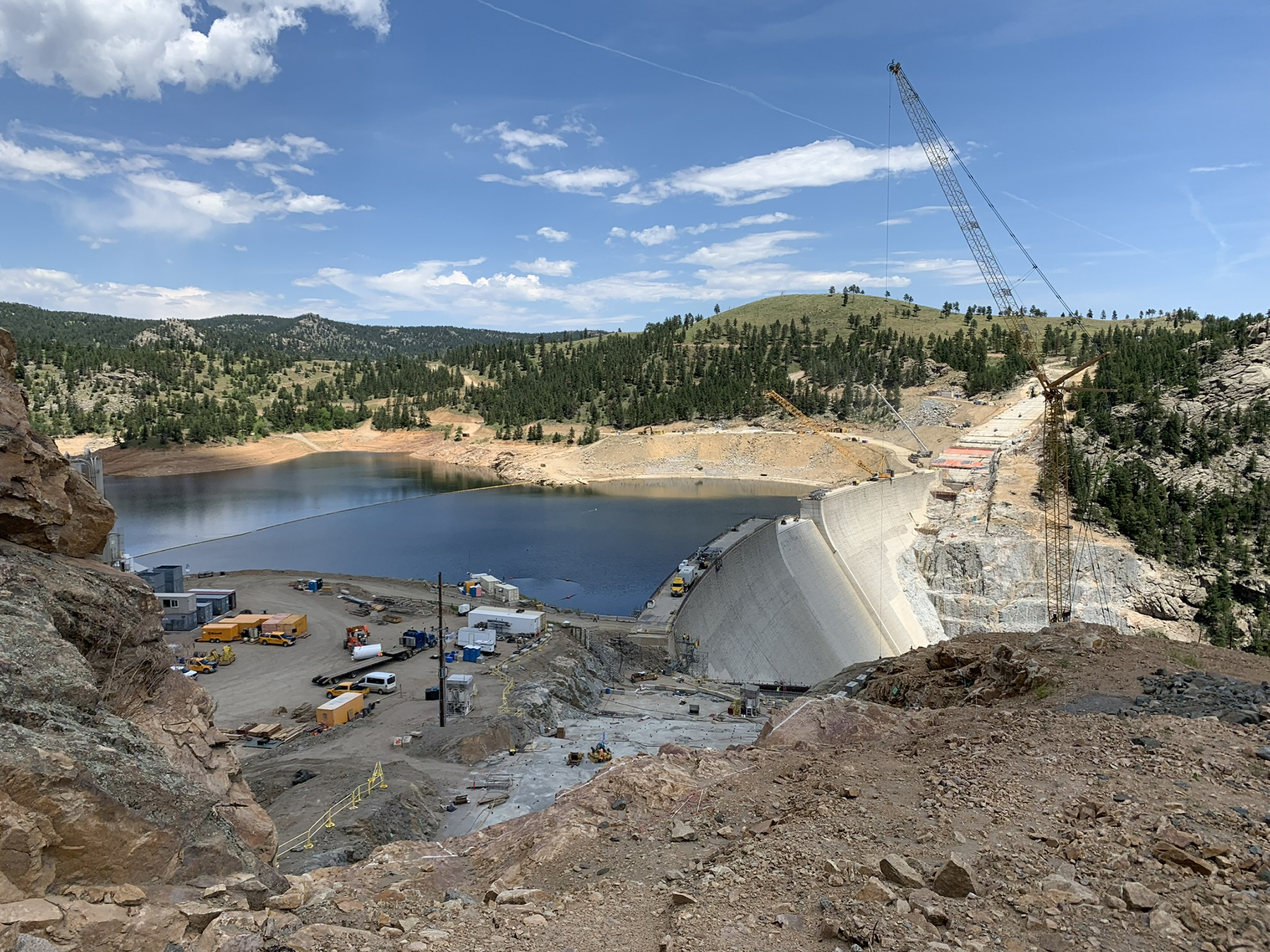 construction crew works at the dam