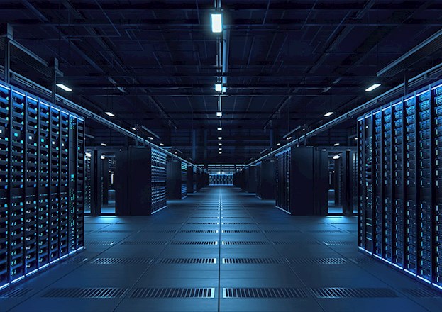 Rows of servers, bathed in blue light, stand ready to support the digital world. 